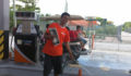The gas attendants are always happy to get a paper! (Photo 10 of 69 photo(s)).