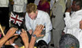 HRH Prince Henry of Wales greets children at the Diamond Jubilee Block Party (Photo 9 of 15 photo(s)).