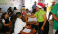 San Pedro Town Council brings Christmas treats to Primary School students (4) (Photo 5 of 10 photo(s)).