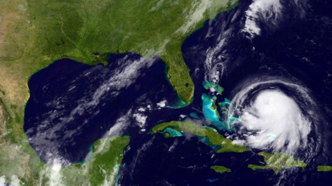 IN SPACE - SEPTEMBER 30:  In this handout from the National Oceanic and Atmospheric Administration (NOAA), Hurricane Joaquin is seen chruning in the Caribbean September 30, 2015. Joaquin was upgraded to a category 1 hurricane early on September 30. The exact track has yet to be determined, but there is a  possibity of landfall in the U.S. anywhere from North Carolina to the Northeast.  (Photo by NOAA)
