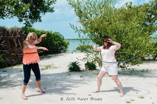 Girls Hula hooping  at the Red Cross fundraiser at Stella's Smile by Karen Brodie Photography