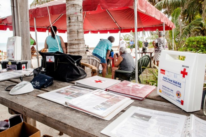 San Pedro Red Cross information table by Erica Barker