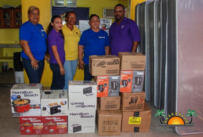 Courts Belize Donates Fire Relief-1