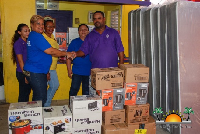 Courts Belize Donates Fire Relief-2